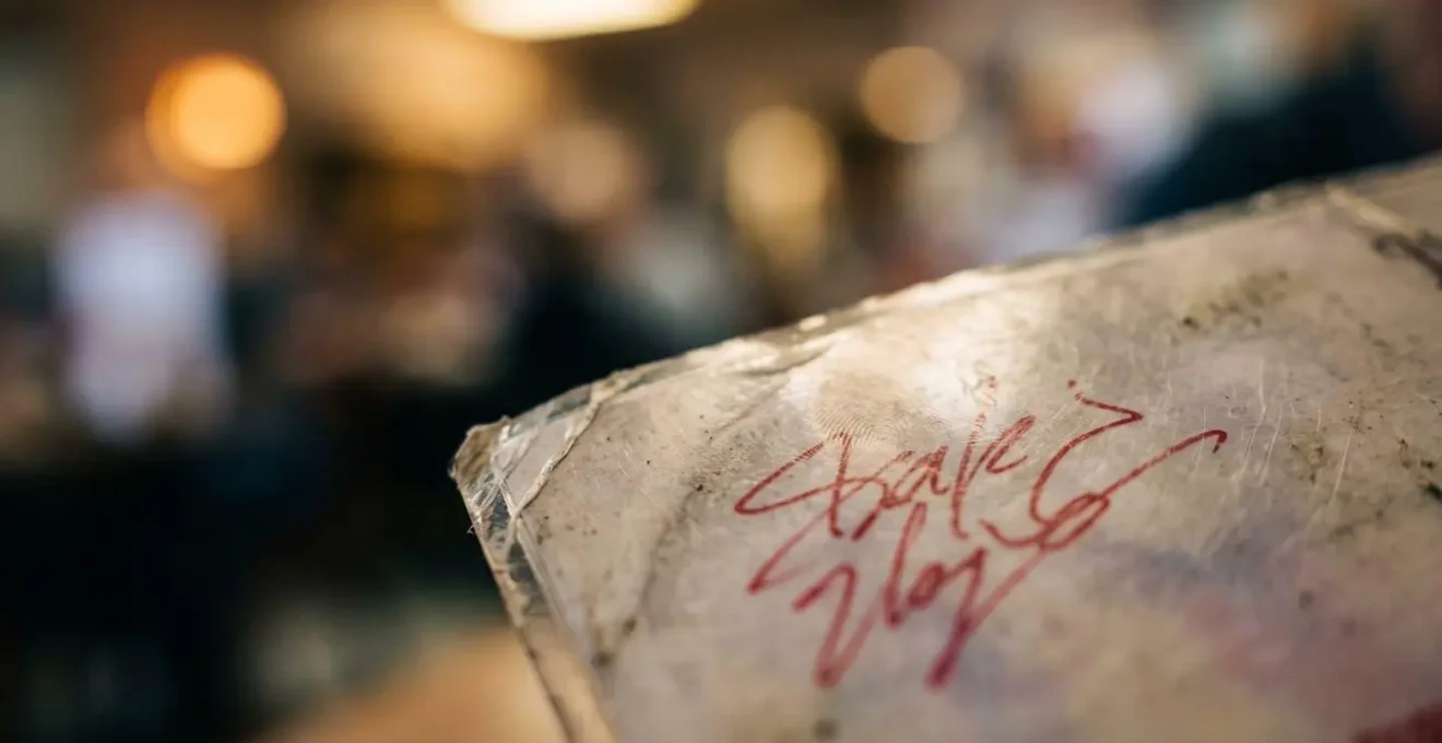 Close-up view of handwritten specials and authentic dining clues in Asian restaurant setting