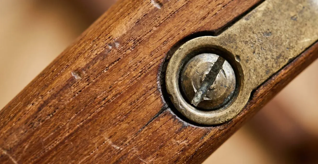 Extreme close-up of authentic mid-century modern furniture showing wood grain texture and craftsmanship details