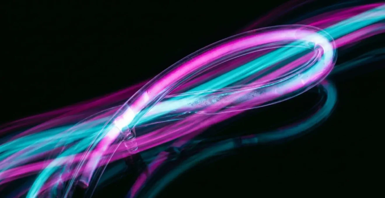 Abstract motion blur of neon light trails showing intentional flicker effect in long exposure